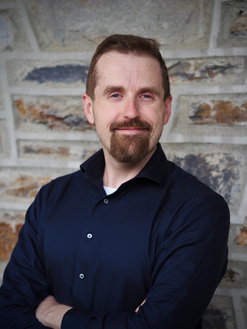 Headshot of Drew Schreiner